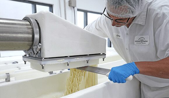 cutting cheese off the head